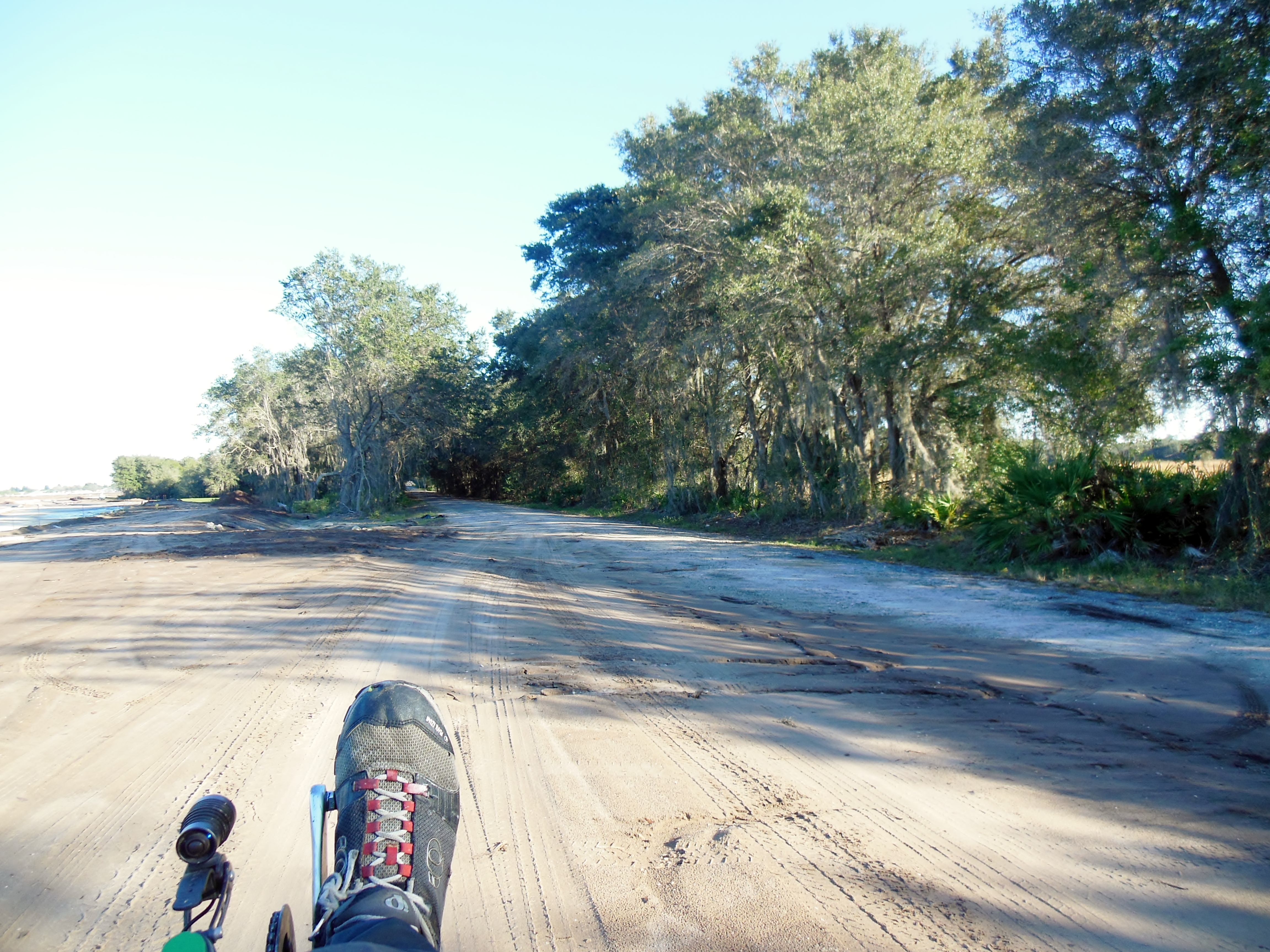 Where the sidewalk ends on White Eagle, ride across 100 yards or so of dirt and get onto Pope Road