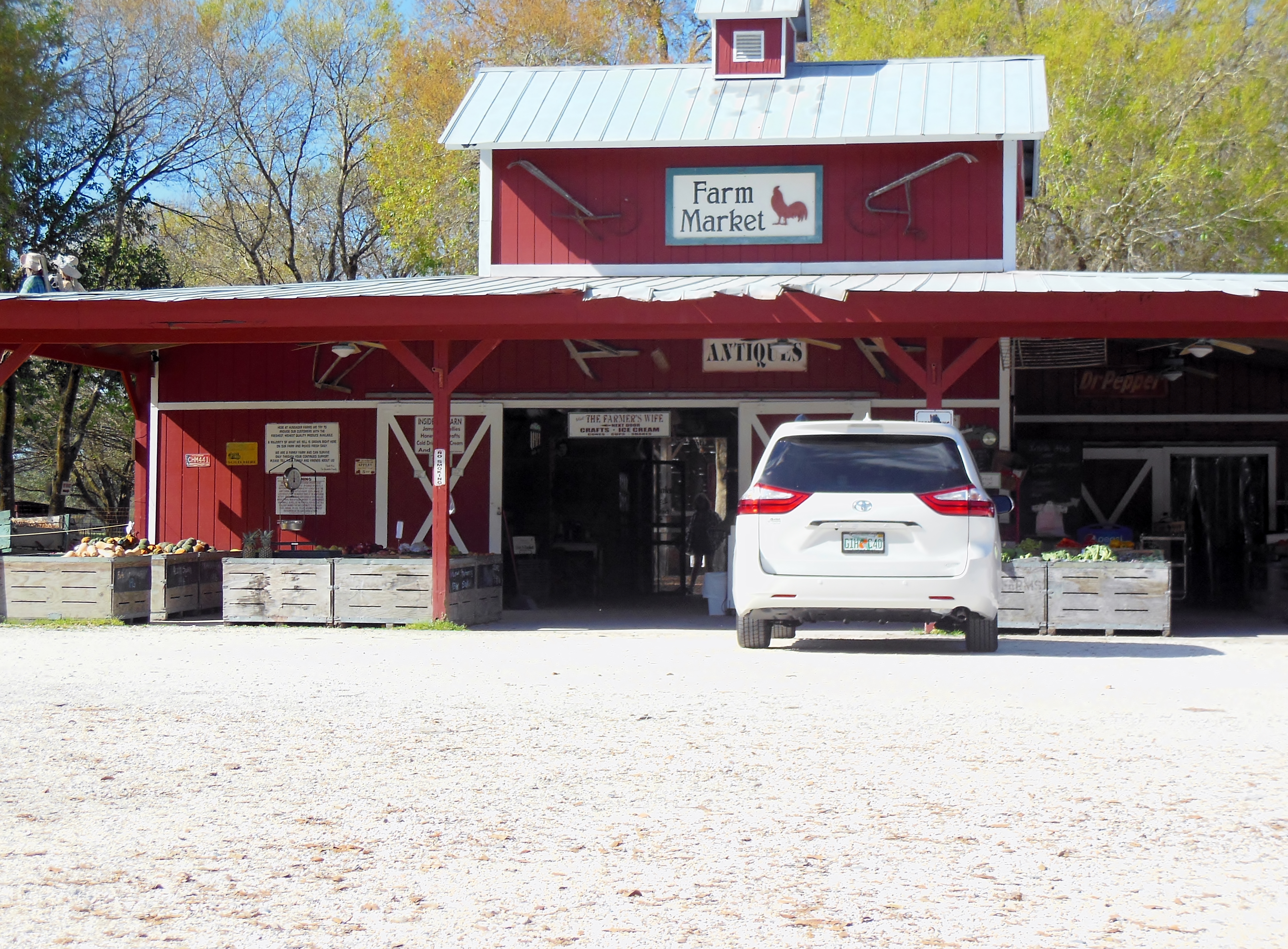 The farm stand is the central building in the complex